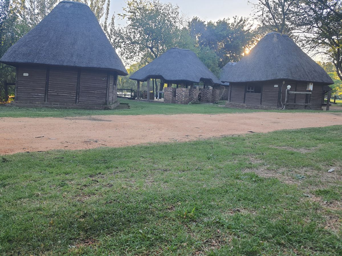 Thatched chalets on the lawn